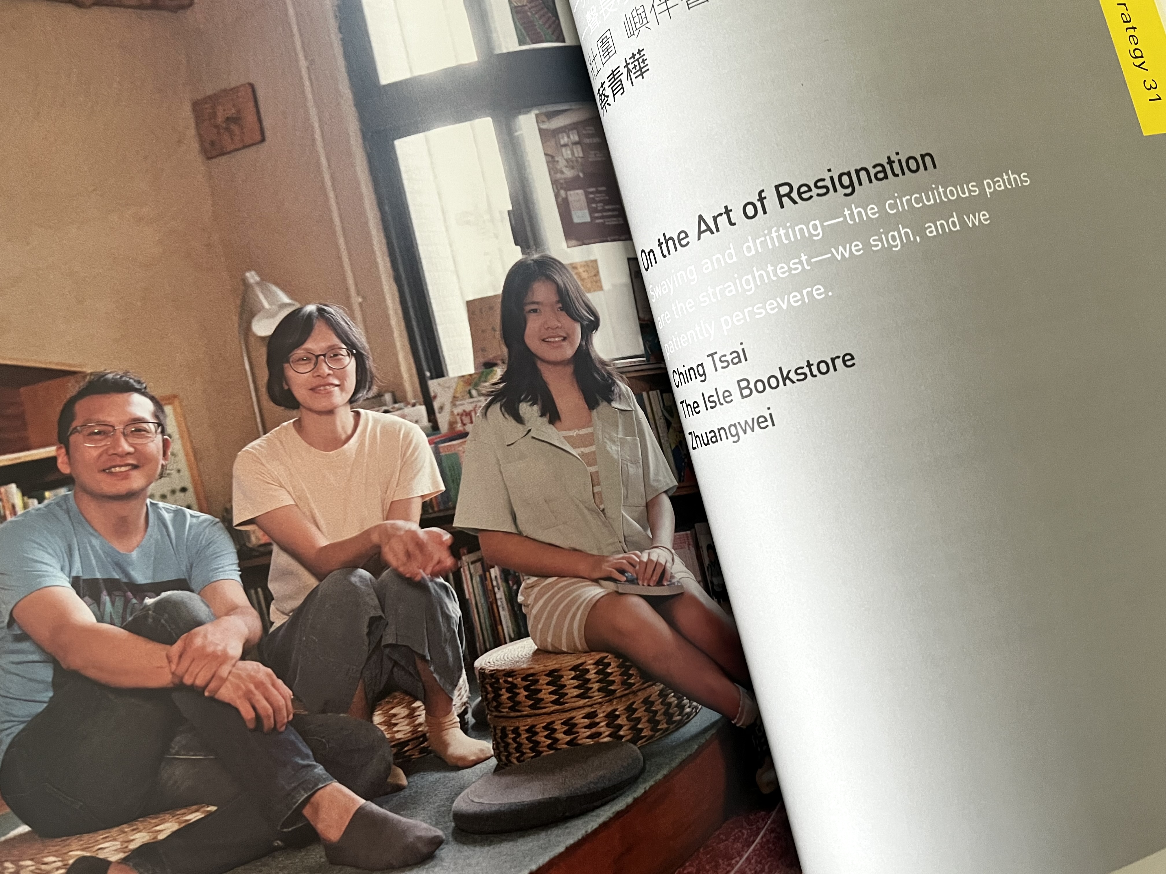 Open book, with image of family of three.